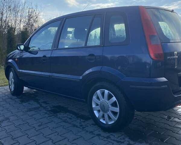 Синий Форд Фьюжн, объемом двигателя 1.4 л и пробегом 341 тыс. км за 3799 $, фото 4 на Automoto.ua