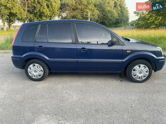 Синій Форд Фьюжен, об'ємом двигуна 1.39 л та пробігом 352 тис. км за 3600 $, фото 3 на Automoto.ua