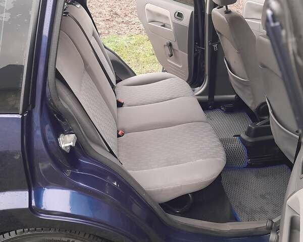 Синій Форд Фьюжен, об'ємом двигуна 1.39 л та пробігом 200 тис. км за 4200 $, фото 9 на Automoto.ua