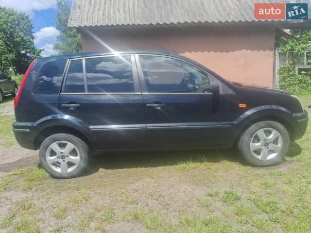 Синій Форд Фьюжен, об'ємом двигуна 1.4 л та пробігом 252 тис. км за 3700 $, фото 4 на Automoto.ua