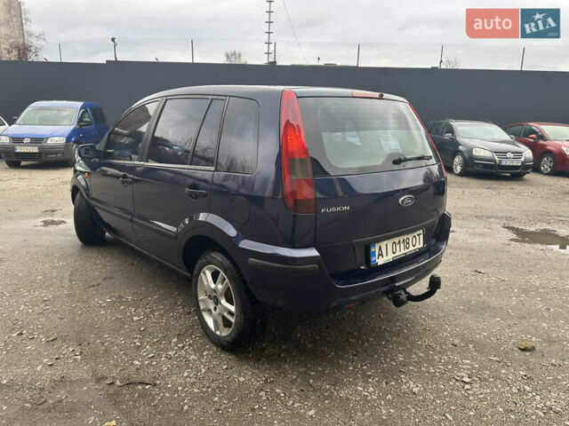 Синий Форд Фьюжн, объемом двигателя 1.6 л и пробегом 302 тыс. км за 4100 $, фото 12 на Automoto.ua