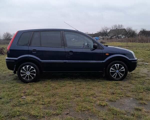 Синій Форд Фьюжен, об'ємом двигуна 1.39 л та пробігом 200 тис. км за 4200 $, фото 2 на Automoto.ua