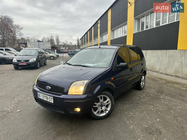 Синий Форд Фьюжн, объемом двигателя 1.6 л и пробегом 302 тыс. км за 4100 $, фото 2 на Automoto.ua