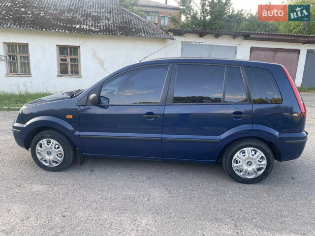 Синій Форд Фьюжен, об'ємом двигуна 1.39 л та пробігом 352 тис. км за 3600 $, фото 7 на Automoto.ua