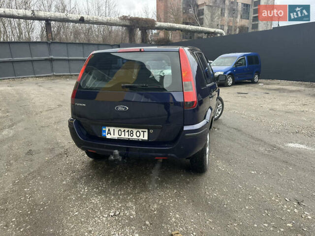 Синий Форд Фьюжн, объемом двигателя 1.6 л и пробегом 302 тыс. км за 4100 $, фото 17 на Automoto.ua