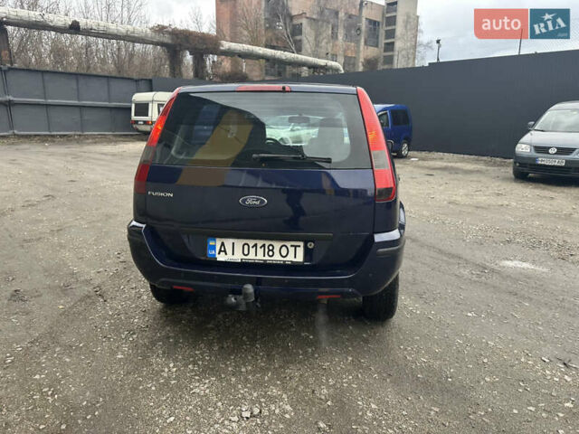 Синий Форд Фьюжн, объемом двигателя 1.6 л и пробегом 302 тыс. км за 4100 $, фото 16 на Automoto.ua