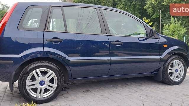 Синий Форд Фьюжн, объемом двигателя 1.4 л и пробегом 144 тыс. км за 4400 $, фото 6 на Automoto.ua