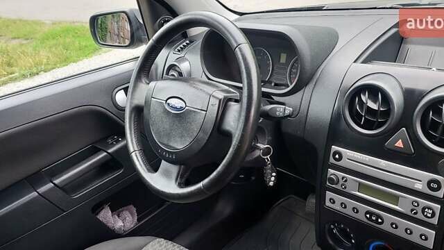 Синий Форд Фьюжн, объемом двигателя 1.4 л и пробегом 144 тыс. км за 4400 $, фото 20 на Automoto.ua