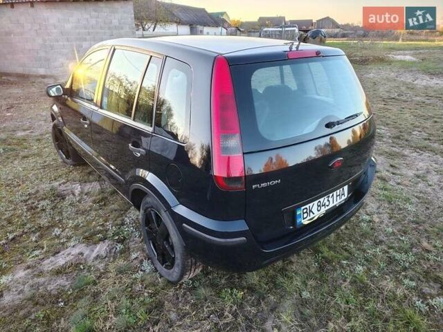 Синій Форд Фьюжен, об'ємом двигуна 1.4 л та пробігом 255 тис. км за 4200 $, фото 1 на Automoto.ua