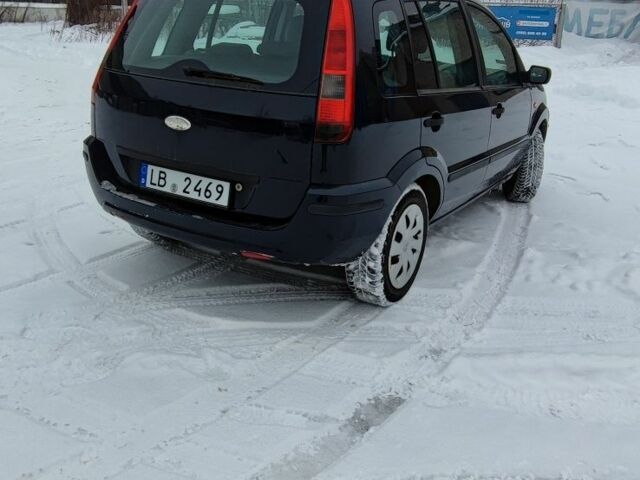 Синий Форд Фьюжн, объемом двигателя 1.4 л и пробегом 250 тыс. км за 1700 $, фото 2 на Automoto.ua