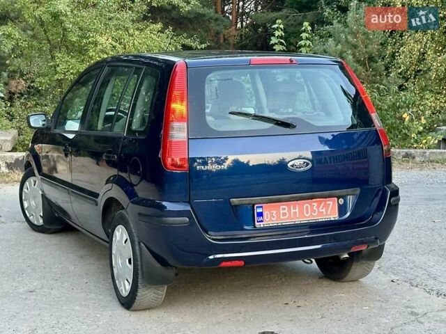 Синій Форд Фьюжен, об'ємом двигуна 1.6 л та пробігом 235 тис. км за 5899 $, фото 7 на Automoto.ua