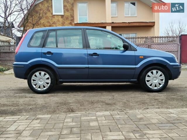 Синій Форд Фьюжен, об'ємом двигуна 1.39 л та пробігом 178 тис. км за 4999 $, фото 11 на Automoto.ua