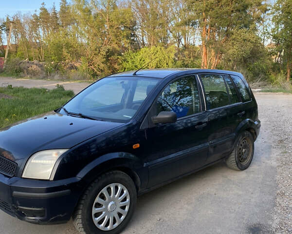 Синій Форд Фьюжен, об'ємом двигуна 1.4 л та пробігом 369 тис. км за 2600 $, фото 9 на Automoto.ua