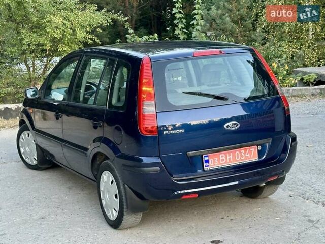Синій Форд Фьюжен, об'ємом двигуна 1.6 л та пробігом 235 тис. км за 5899 $, фото 11 на Automoto.ua
