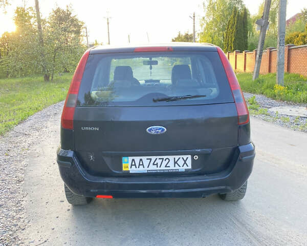 Синій Форд Фьюжен, об'ємом двигуна 1.4 л та пробігом 369 тис. км за 2600 $, фото 6 на Automoto.ua