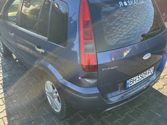 Синий Форд Фьюжн, объемом двигателя 1.4 л и пробегом 150 тыс. км за 4100 $, фото 3 на Automoto.ua