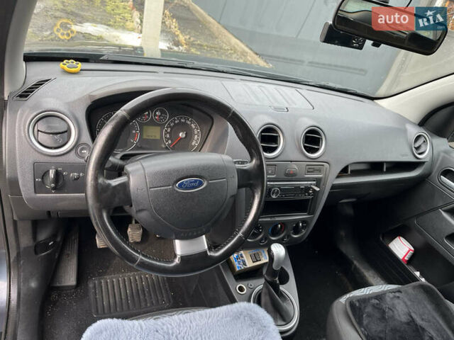 Синій Форд Фьюжен, об'ємом двигуна 1.4 л та пробігом 190 тис. км за 5700 $, фото 11 на Automoto.ua