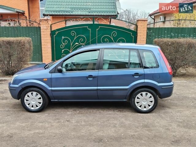 Синій Форд Фьюжен, об'ємом двигуна 1.39 л та пробігом 178 тис. км за 4999 $, фото 3 на Automoto.ua