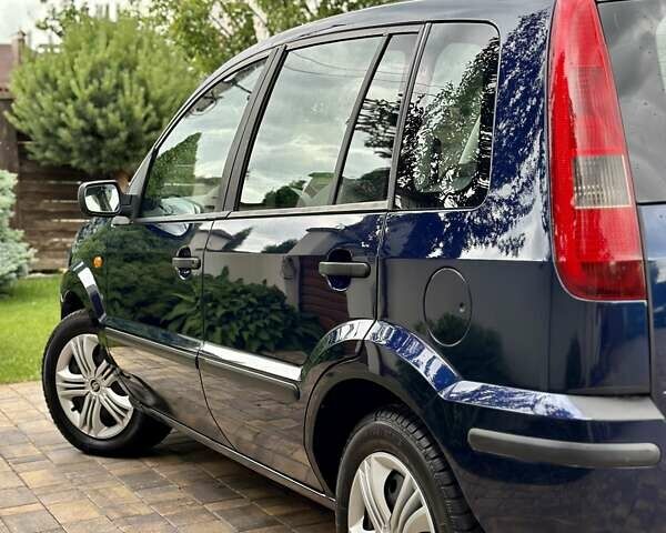 Синій Форд Фьюжен, об'ємом двигуна 1.4 л та пробігом 236 тис. км за 4399 $, фото 10 на Automoto.ua