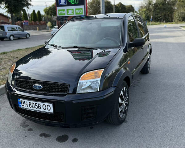 Синій Форд Фьюжен, об'ємом двигуна 1.39 л та пробігом 233 тис. км за 4650 $, фото 11 на Automoto.ua