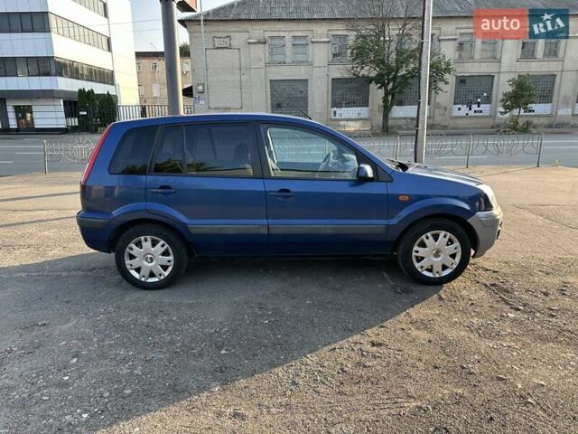 Синий Форд Фьюжн, объемом двигателя 1.6 л и пробегом 314 тыс. км за 5400 $, фото 4 на Automoto.ua