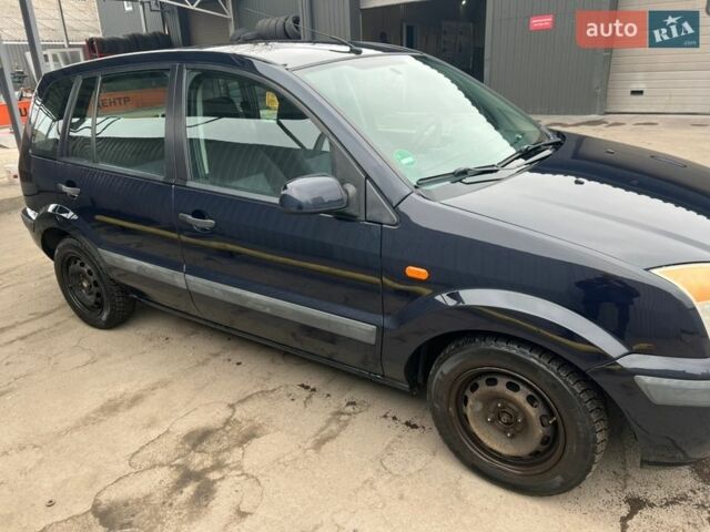 Синий Форд Фьюжн, объемом двигателя 1.39 л и пробегом 302 тыс. км за 4500 $, фото 13 на Automoto.ua