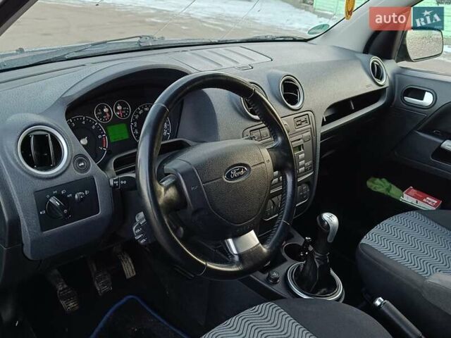 Синий Форд Фьюжн, объемом двигателя 1.4 л и пробегом 230 тыс. км за 4500 $, фото 8 на Automoto.ua