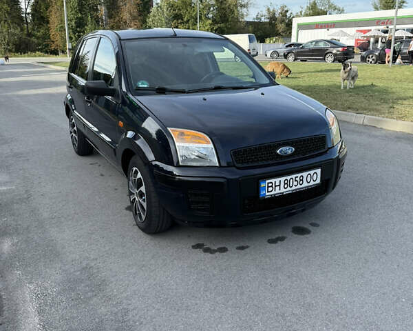 Синій Форд Фьюжен, об'ємом двигуна 1.39 л та пробігом 233 тис. км за 4650 $, фото 9 на Automoto.ua