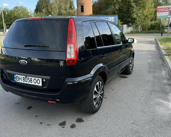 Синій Форд Фьюжен, об'ємом двигуна 1.39 л та пробігом 233 тис. км за 4650 $, фото 13 на Automoto.ua