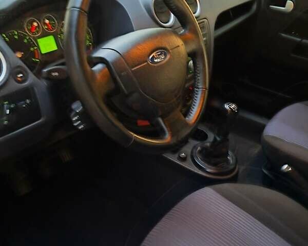 Синій Форд Фьюжен, об'ємом двигуна 1.4 л та пробігом 189 тис. км за 4750 $, фото 21 на Automoto.ua