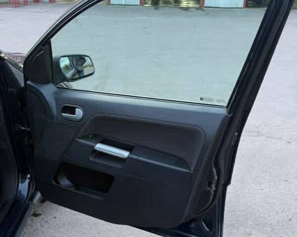 Синій Форд Фьюжен, об'ємом двигуна 1.39 л та пробігом 230 тис. км за 4650 $, фото 8 на Automoto.ua