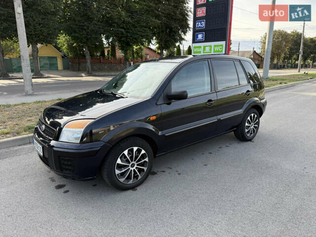 Синій Форд Фьюжен, об'ємом двигуна 1.39 л та пробігом 233 тис. км за 4650 $, фото 3 на Automoto.ua