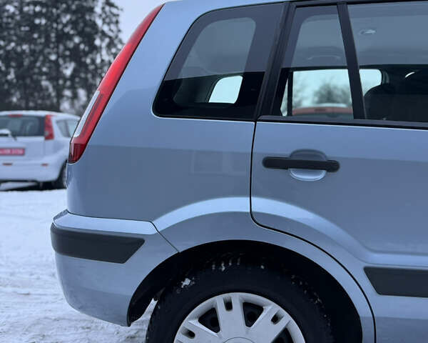 Синій Форд Фьюжен, об'ємом двигуна 1.4 л та пробігом 195 тис. км за 4750 $, фото 36 на Automoto.ua