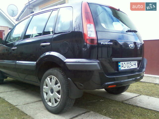 Синий Форд Фьюжн, объемом двигателя 1.4 л и пробегом 263 тыс. км за 4200 $, фото 5 на Automoto.ua