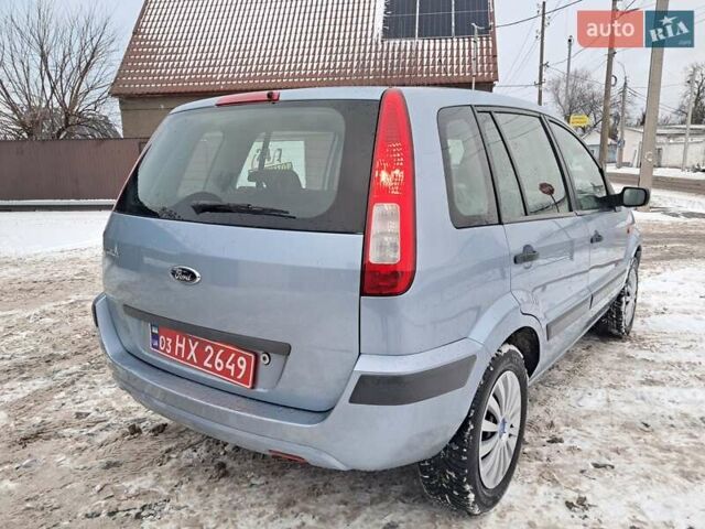 Синий Форд Фьюжн, объемом двигателя 1.4 л и пробегом 215 тыс. км за 4770 $, фото 6 на Automoto.ua