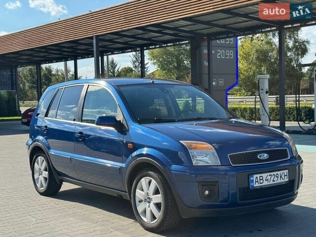 Синій Форд Фьюжен, об'ємом двигуна 1.39 л та пробігом 190 тис. км за 5450 $, фото 6 на Automoto.ua