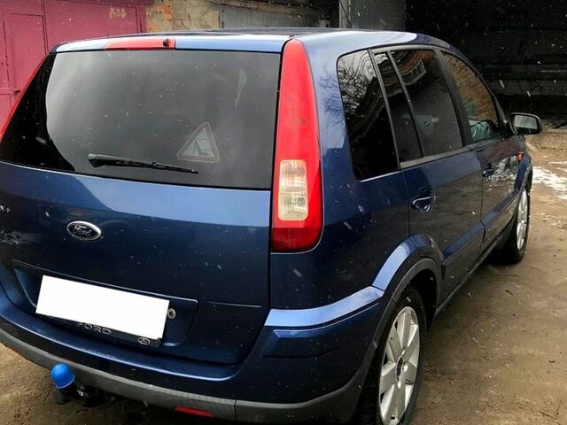 Синій Форд Фьюжен, об'ємом двигуна 14 л та пробігом 233 тис. км за 5400 $, фото 4 на Automoto.ua