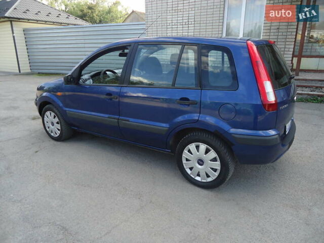 Синий Форд Фьюжн, объемом двигателя 1.39 л и пробегом 165 тыс. км за 5200 $, фото 12 на Automoto.ua