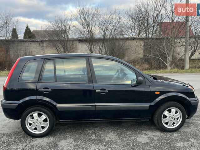 Синий Форд Фьюжн, объемом двигателя 1.6 л и пробегом 184 тыс. км за 4599 $, фото 3 на Automoto.ua