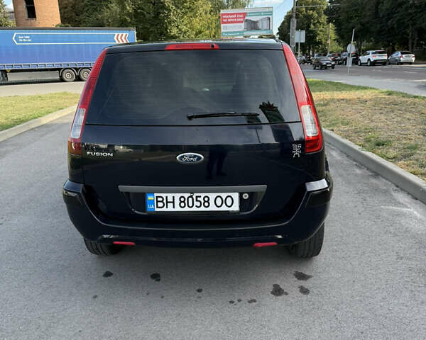 Синій Форд Фьюжен, об'ємом двигуна 1.39 л та пробігом 233 тис. км за 4650 $, фото 6 на Automoto.ua