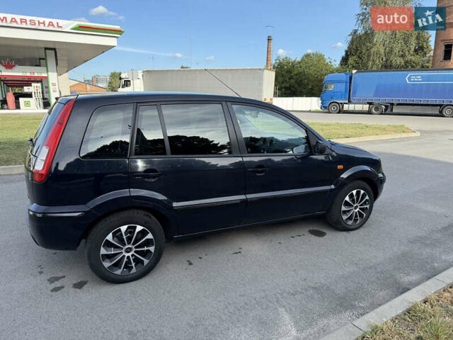 Синій Форд Фьюжен, об'ємом двигуна 1.39 л та пробігом 233 тис. км за 4650 $, фото 8 на Automoto.ua