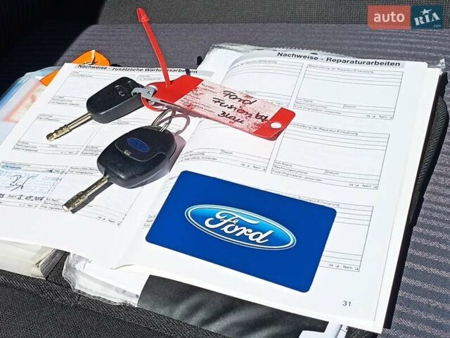 Синій Форд Фьюжен, об'ємом двигуна 1.39 л та пробігом 128 тис. км за 5300 $, фото 18 на Automoto.ua