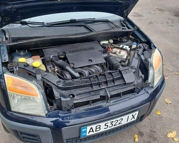 Синій Форд Фьюжен, об'ємом двигуна 1.39 л та пробігом 225 тис. км за 4200 $, фото 6 на Automoto.ua