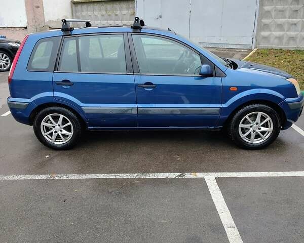 Синий Форд Фьюжн, объемом двигателя 1.39 л и пробегом 318 тыс. км за 3800 $, фото 5 на Automoto.ua