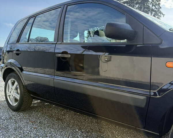 Синій Форд Фьюжен, об'ємом двигуна 1.4 л та пробігом 188 тис. км за 4900 $, фото 59 на Automoto.ua