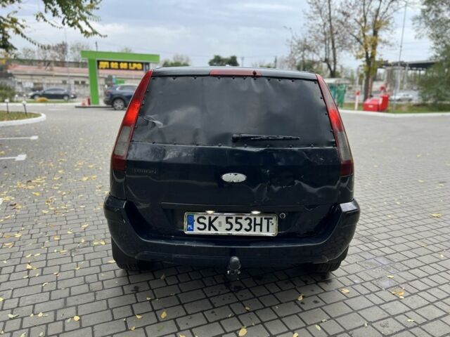 Синій Форд Фьюжен, об'ємом двигуна 1.4 л та пробігом 220 тис. км за 1852 $, фото 11 на Automoto.ua