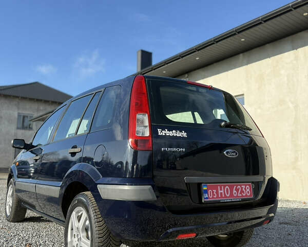 Синій Форд Фьюжен, об'ємом двигуна 1.4 л та пробігом 188 тис. км за 4900 $, фото 70 на Automoto.ua