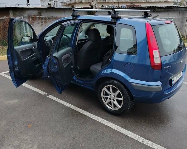 Синий Форд Фьюжн, объемом двигателя 1.39 л и пробегом 318 тыс. км за 3800 $, фото 4 на Automoto.ua