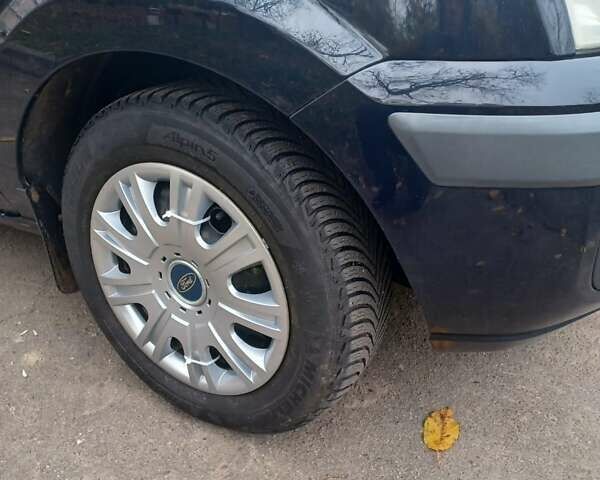 Синій Форд Фьюжен, об'ємом двигуна 1.39 л та пробігом 225 тис. км за 4200 $, фото 5 на Automoto.ua