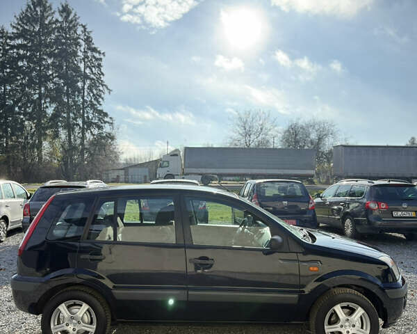 Синій Форд Фьюжен, об'ємом двигуна 1.4 л та пробігом 188 тис. км за 4900 $, фото 10 на Automoto.ua